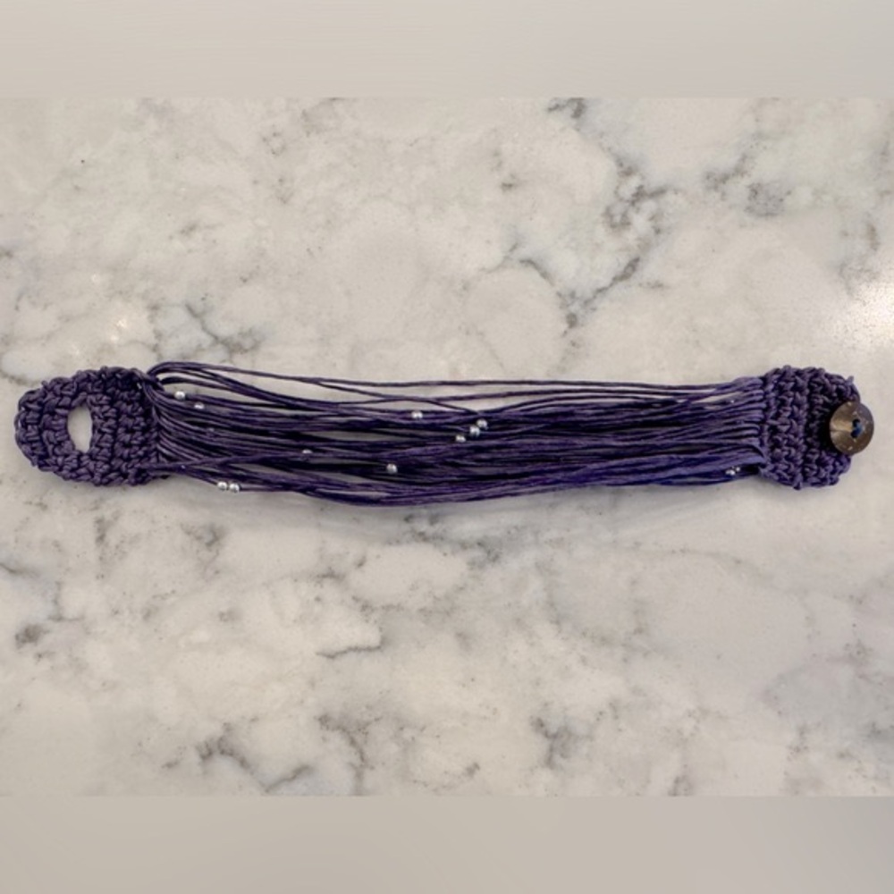 Girls/Teens Purple bracelet, 8 inches long - 1  inch wide - button closure